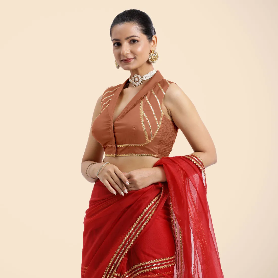 Avni x Tyohaar | Metallic Copper Sleeveless FlexiFit™ Saree Blouse with Elegant Shawl Collar with Golden Gota Lace Embellishment