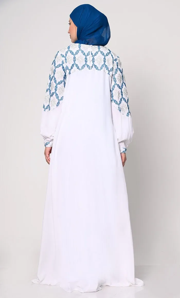 Elegant Simplicity: Embroidered White Abaya with Box Pleats and Dual Pockets